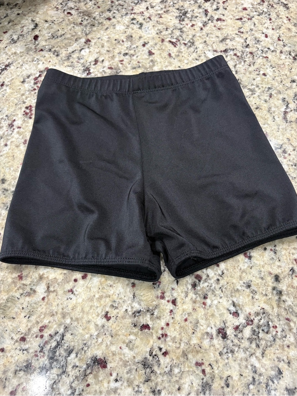 Unbranded black gym dance shorts in Child Large I.W. (4) Good Condition